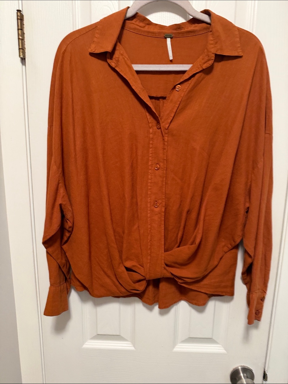 Women’s like new. blouse size medium from buckle. rust color
